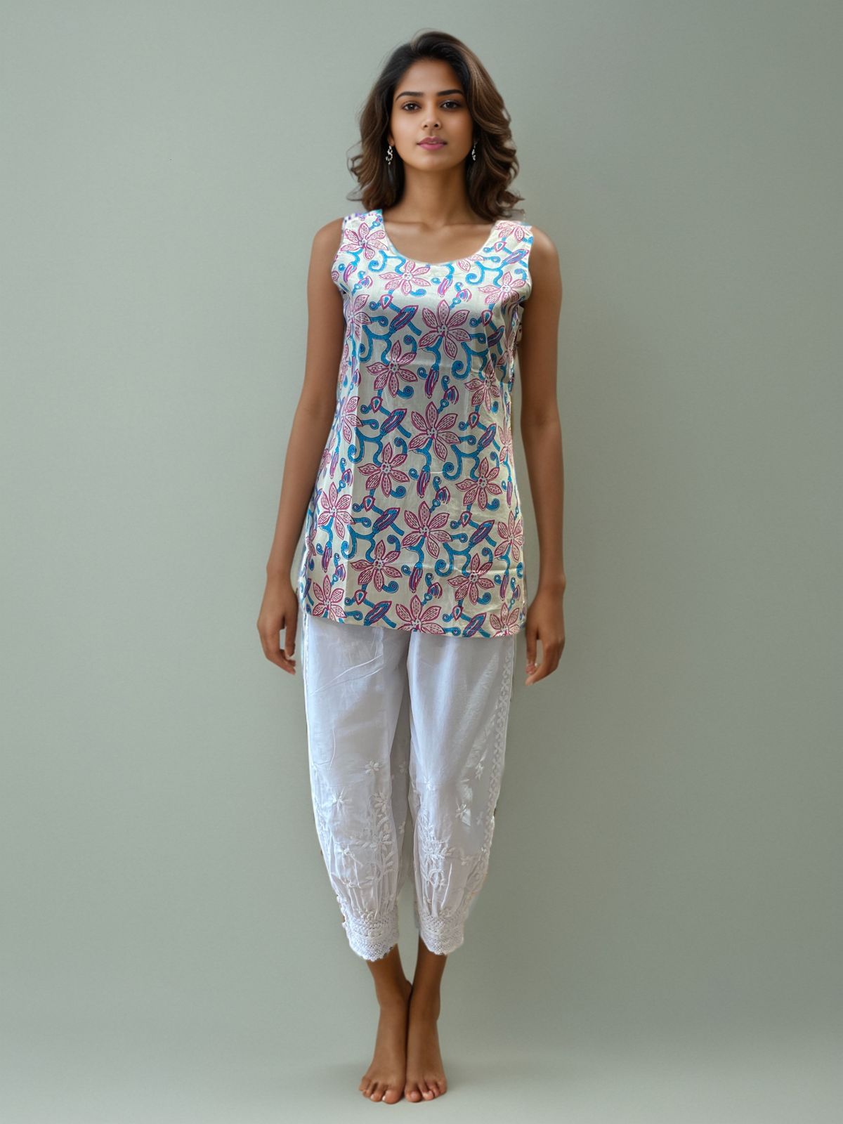 Off-White Sleeveless Multicolor Floral Embroidered Cotton Kurti