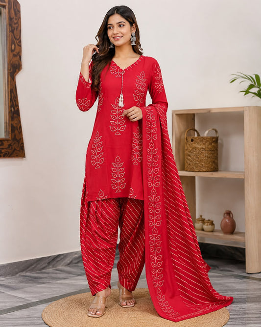 Women’s Red Cotton Printed Kurti Set with Dupatta – V-Neck Kurta, Dhoti-Style Pants & Tassel Detail